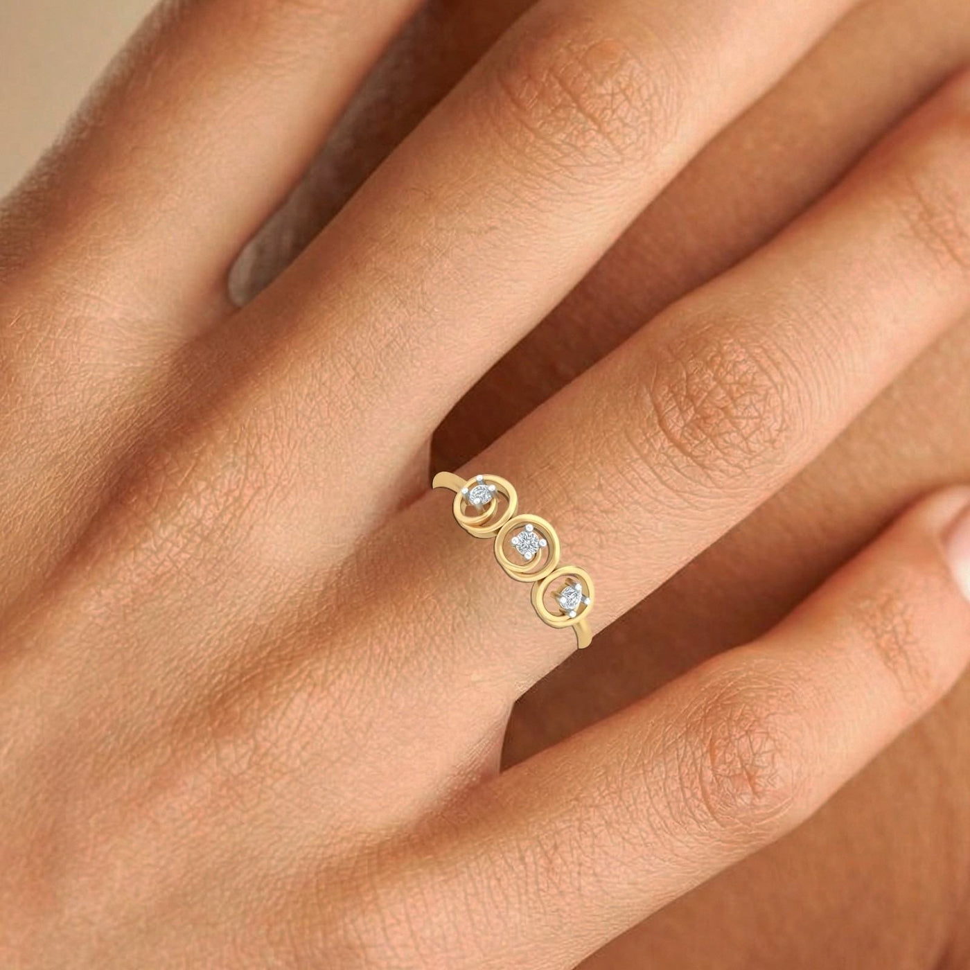 Close-up shot of a gold and diamond with circular women's ring.
