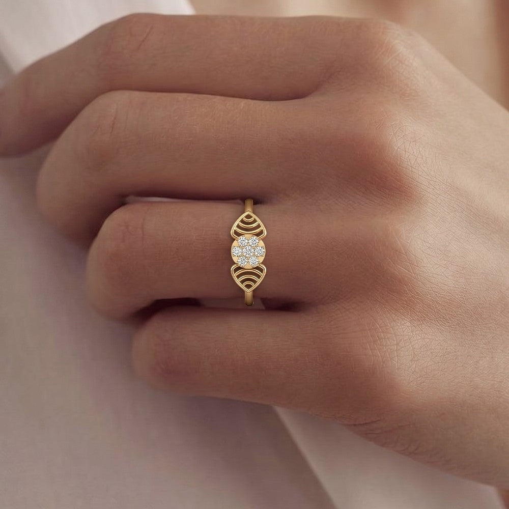 Close-up shot of a gold and diamond ring with a central cluster ring.