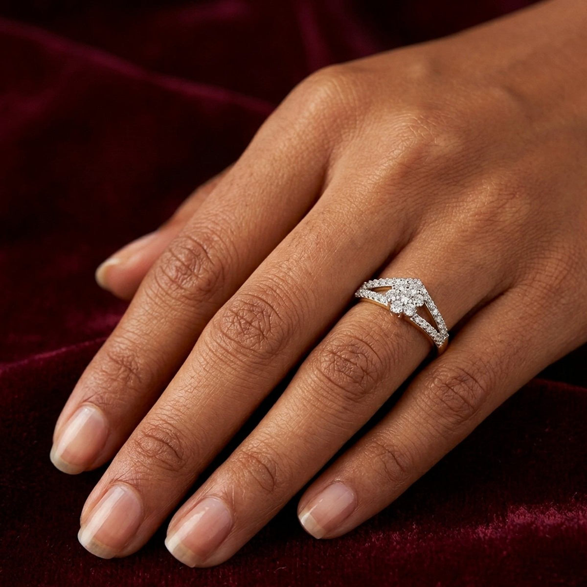 Close-up shot of a gold and diamond cluster ring.