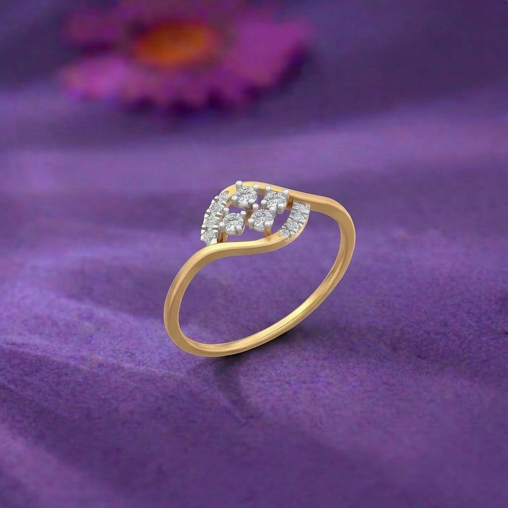 Gold and diamond with cluster setting on a purple surface.