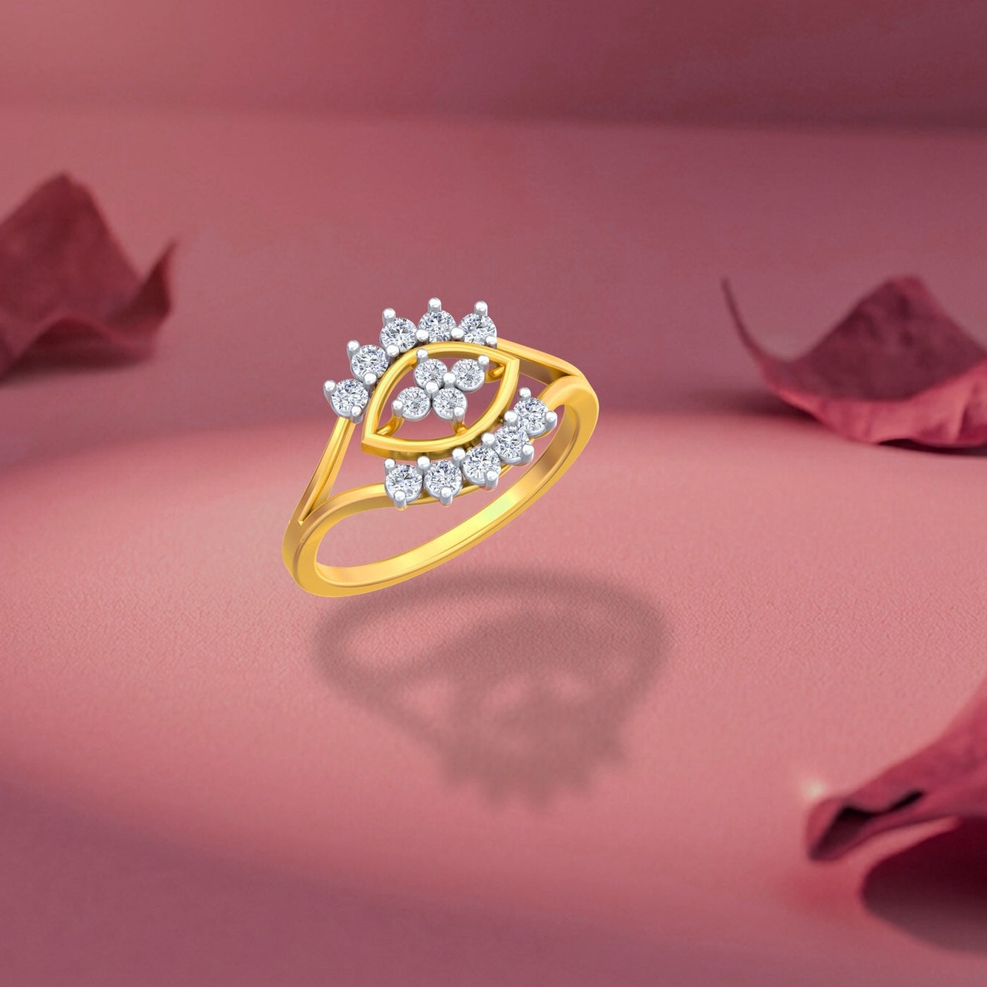 Gold ring with diamonds on a pink background.
