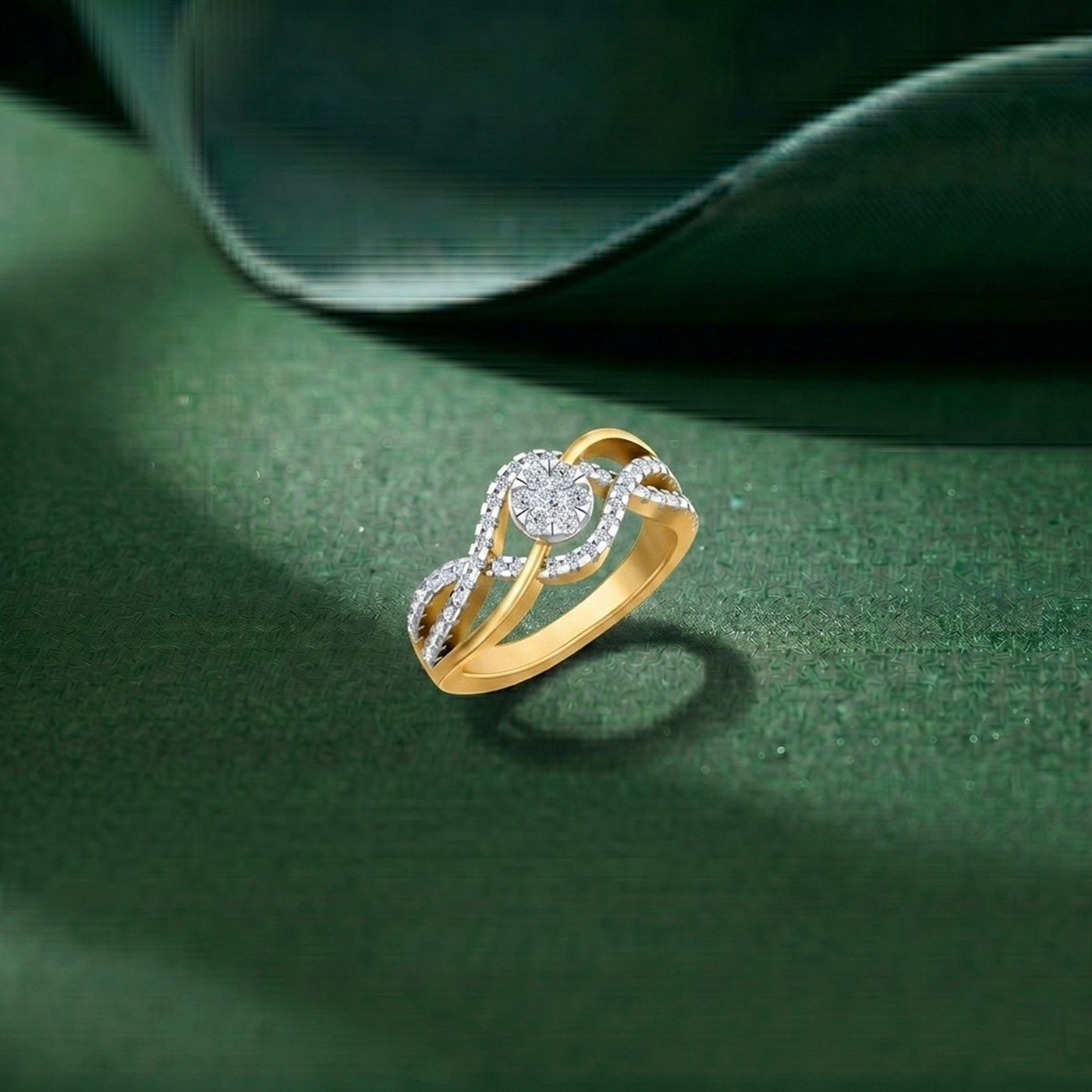 Gold ring with diamonds on a green background