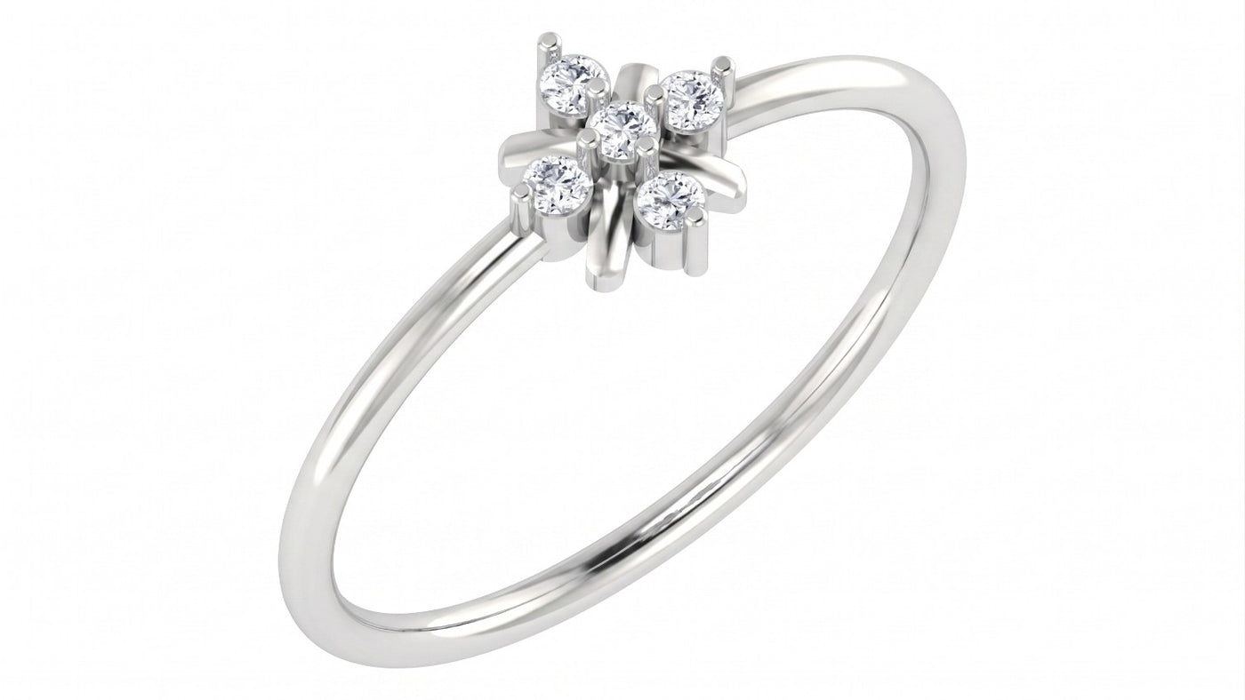 A white gold and diamond ring with a small floral setting, shown on a plain white background.
