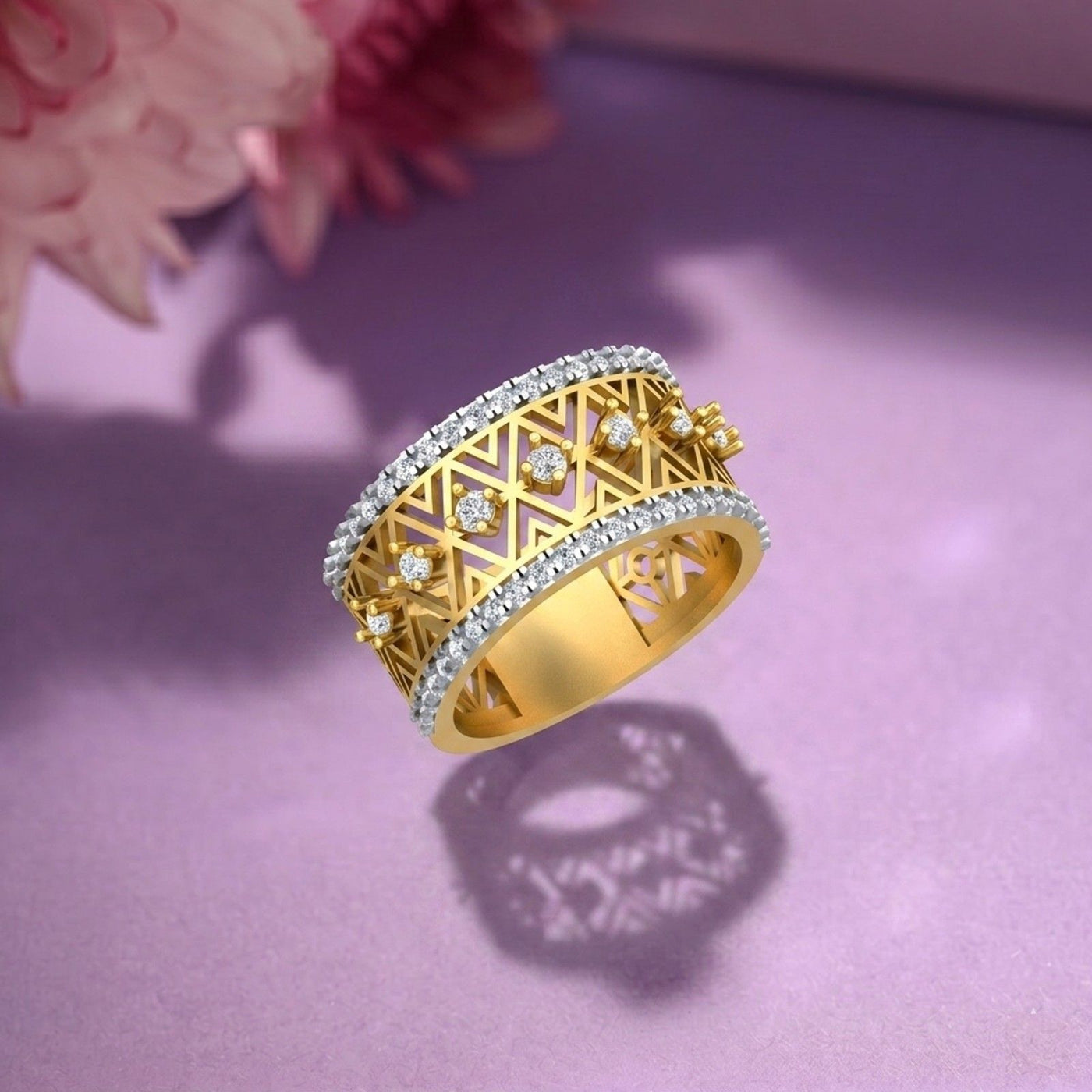Gold ring with diamond accents on a purple surface