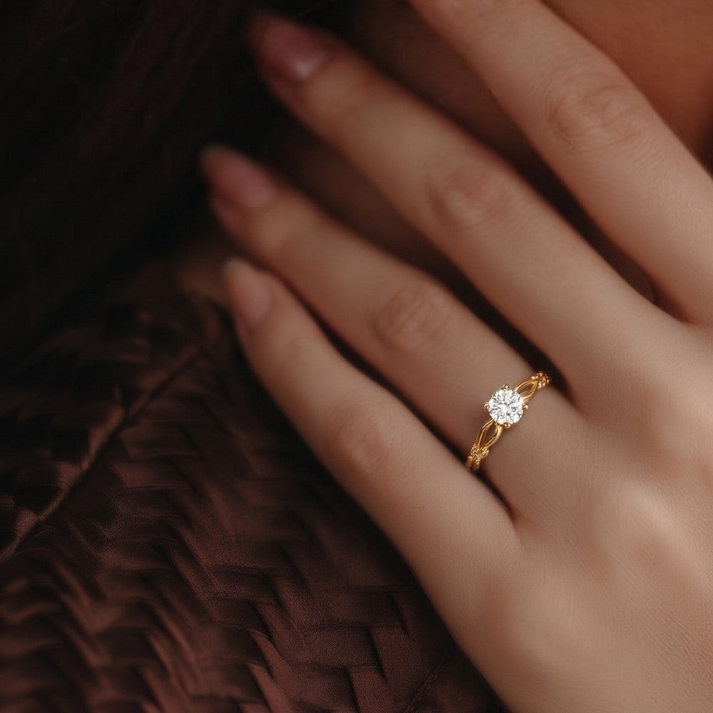 Close-up shot of a gold ring with a diamond  ring.