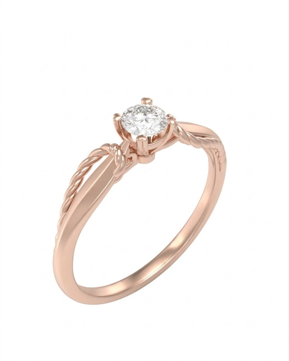Rose gold and diamond with solitaire ring on a white background.