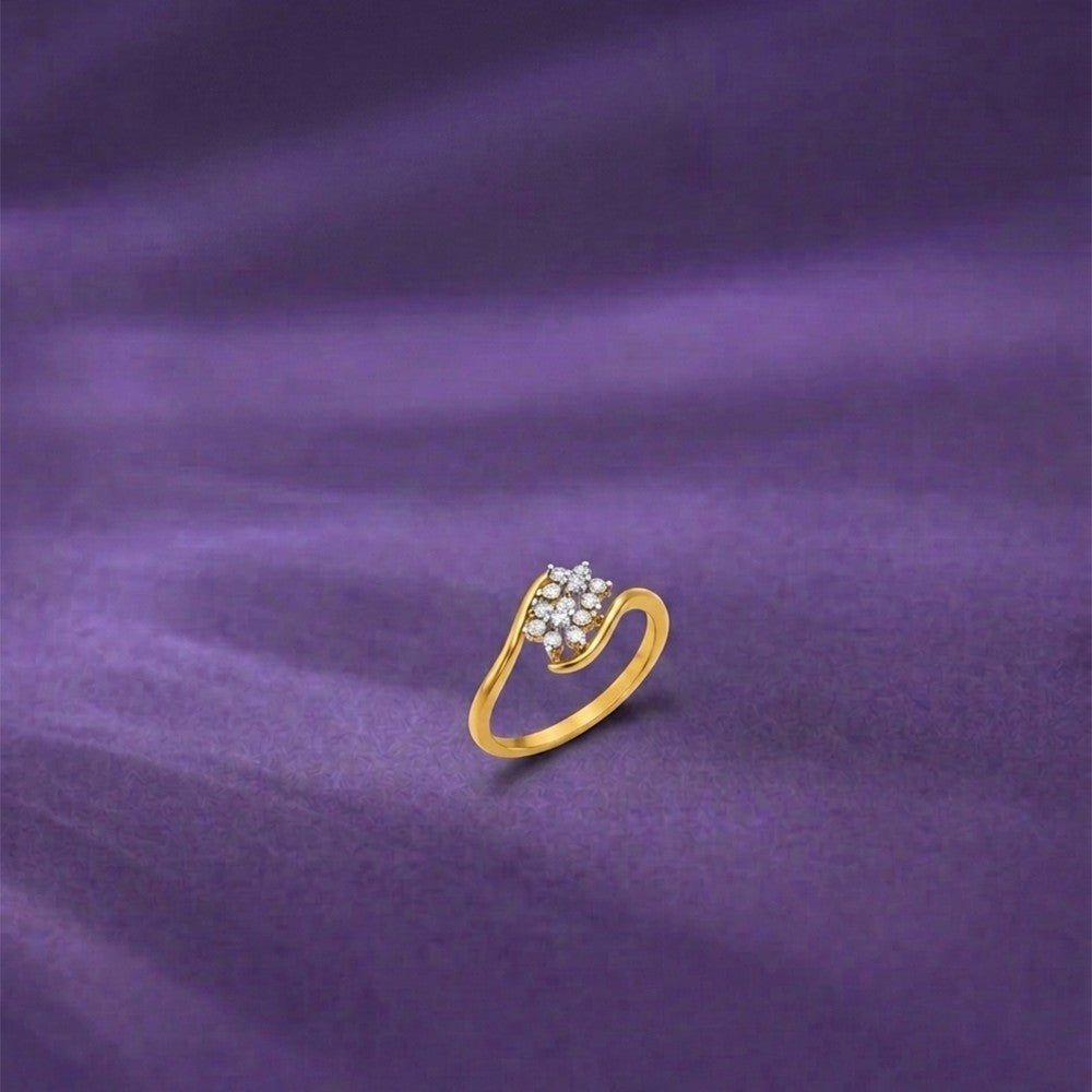 Gold and diamond with floral cluster on a blue surface.