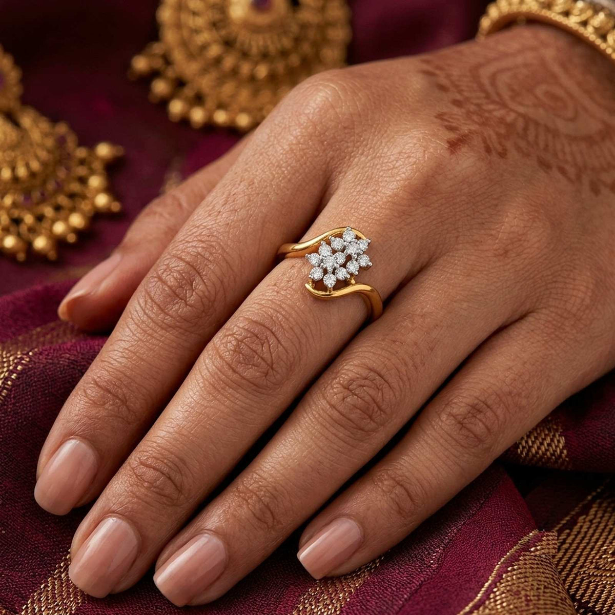 Close-up shots of a gold and diamond with floral cluster.