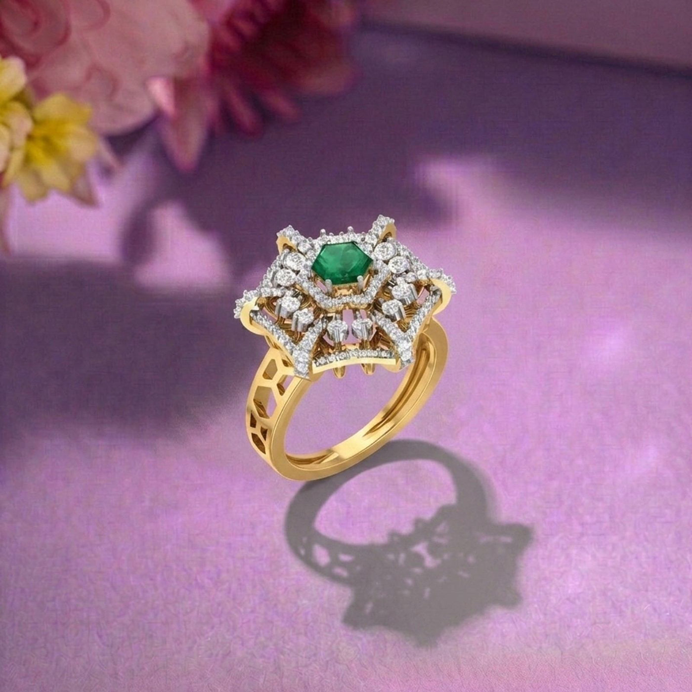 Gold and diamond with emerald gemstone setting on a pink surface.