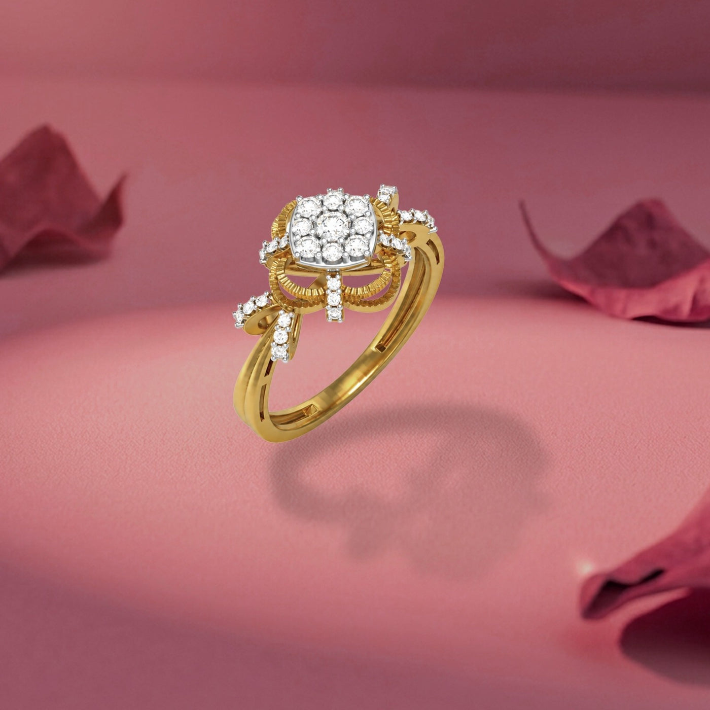 Gold ring with diamonds on a pink background