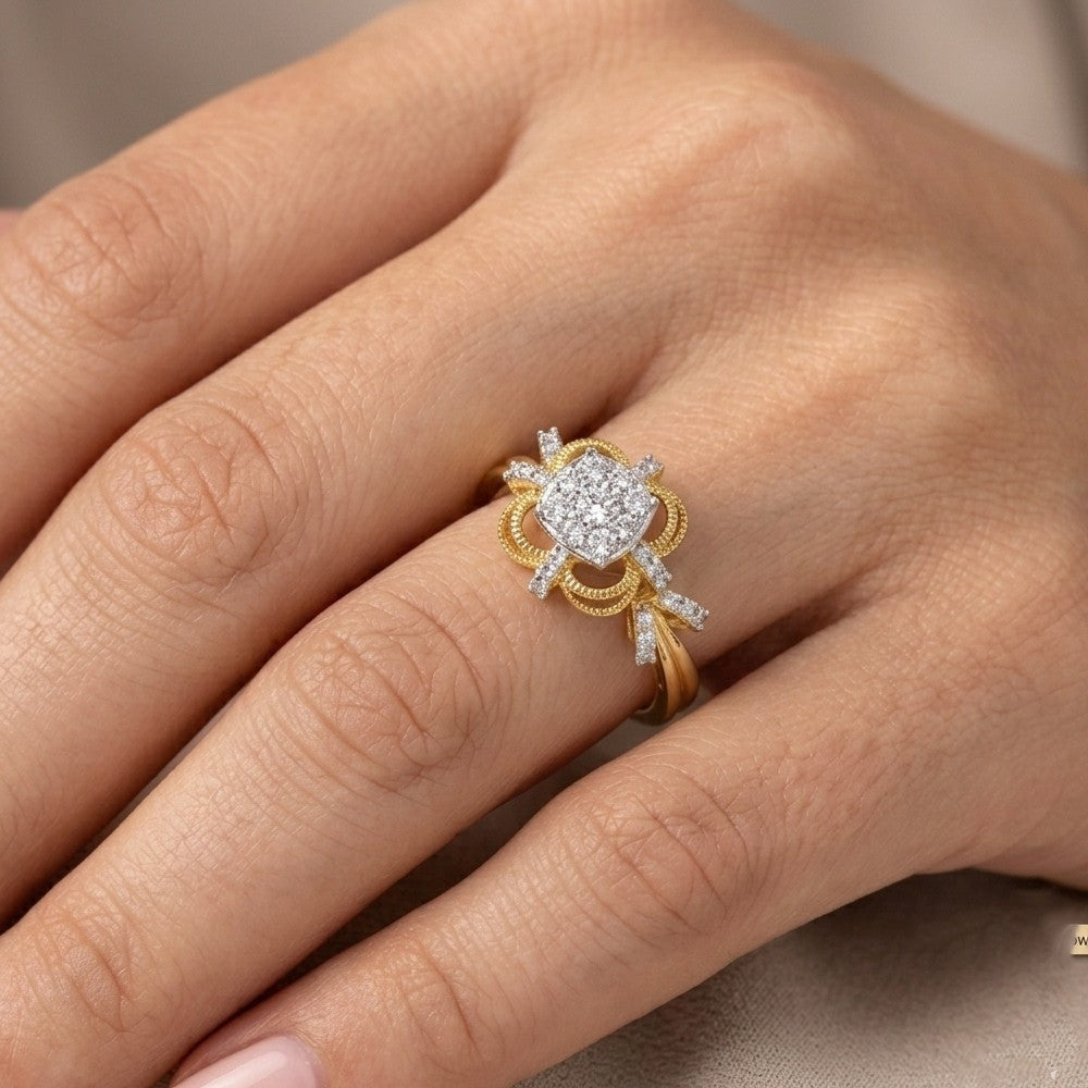Gold and diamond ring on a person's finger against a neutral background