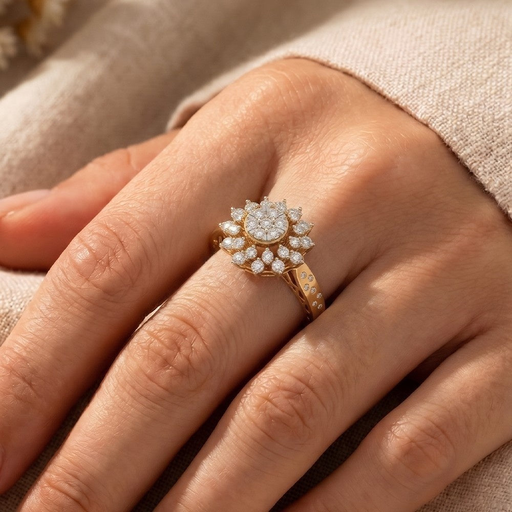 Rose gold ring with diamonds on a hand against a neutral background.