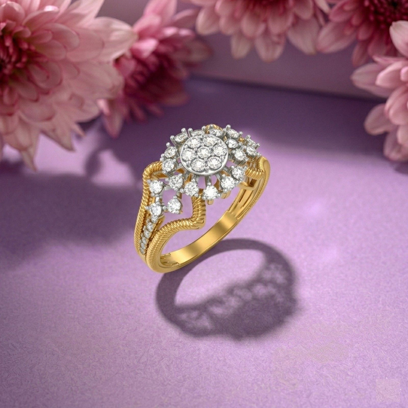 Gold ring with diamonds on a purple surface with pink flowers in the background.