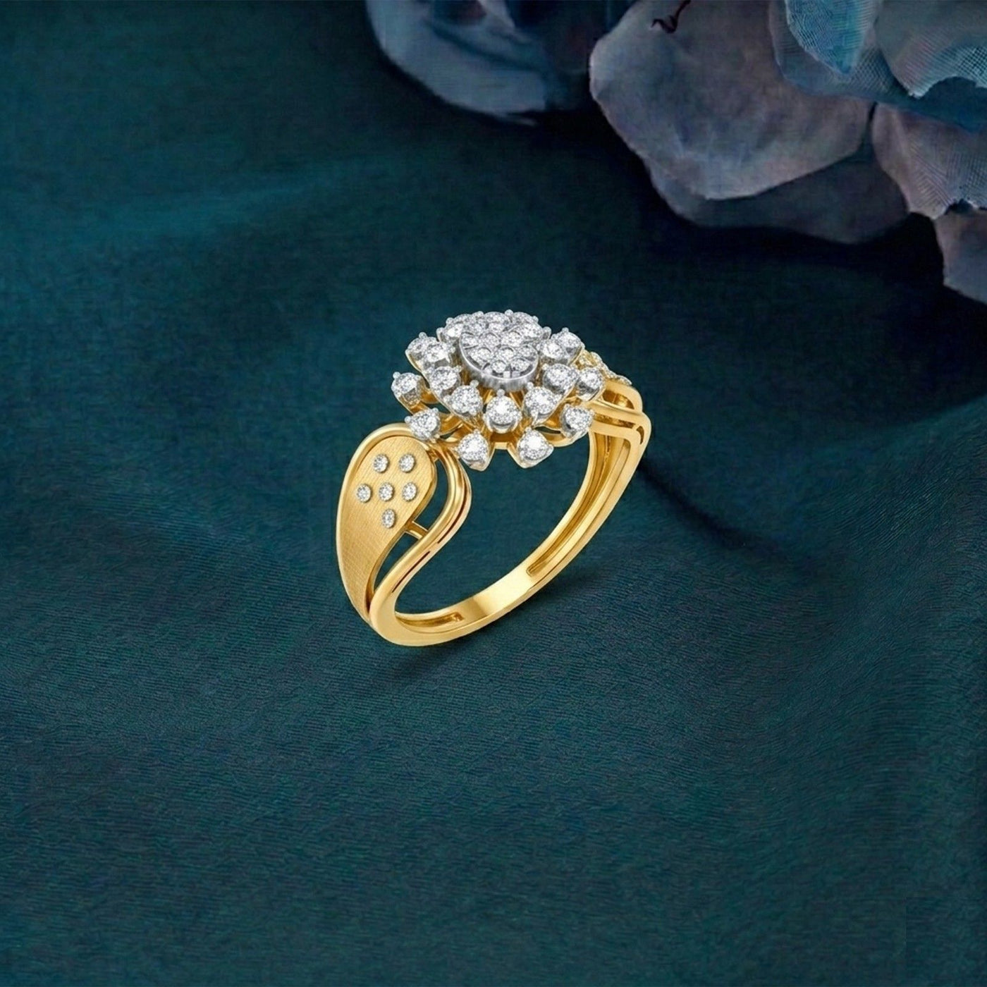 Gold ring with diamond accents on a dark green background.