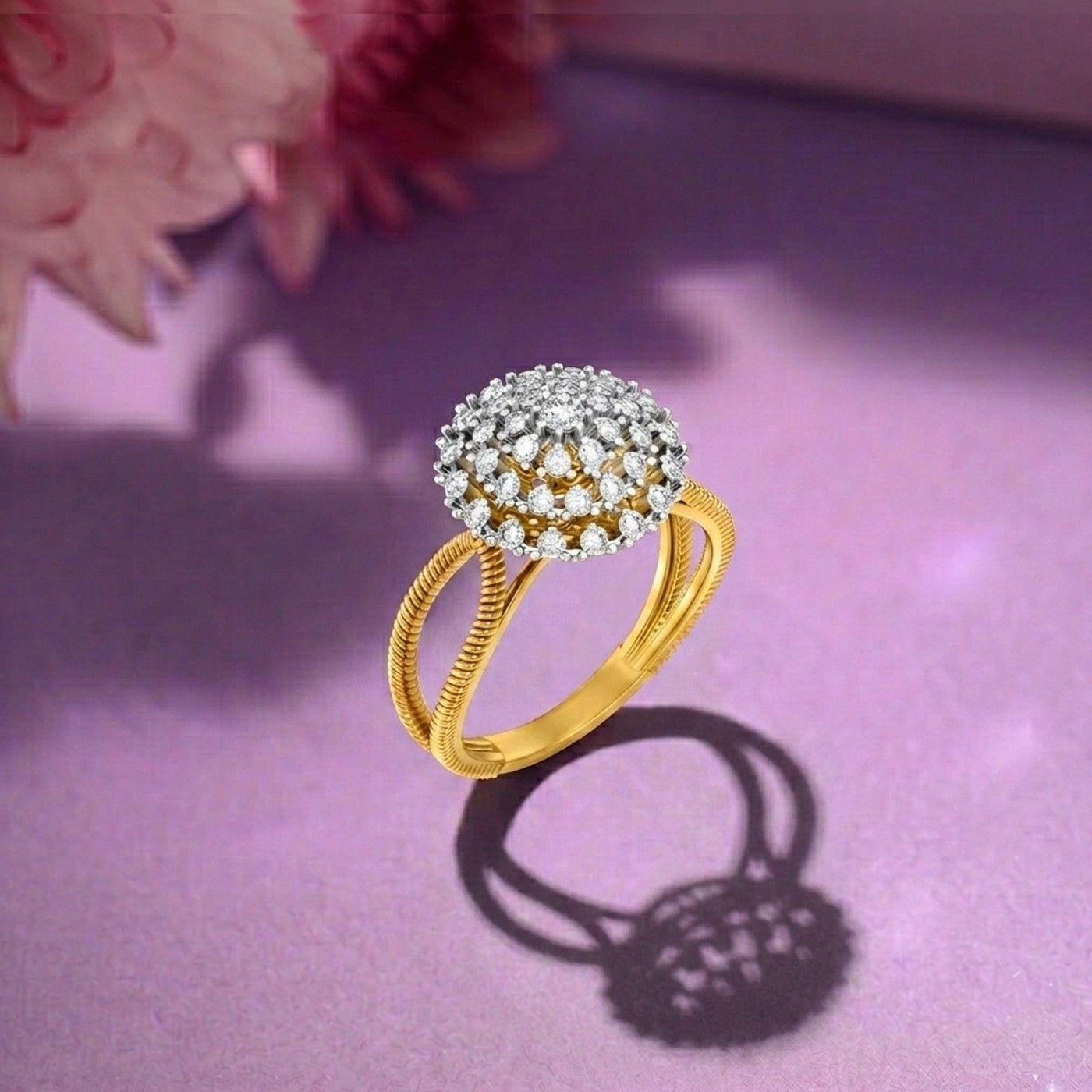 Gold ring and diamond with clocktail ring on a pink surface
