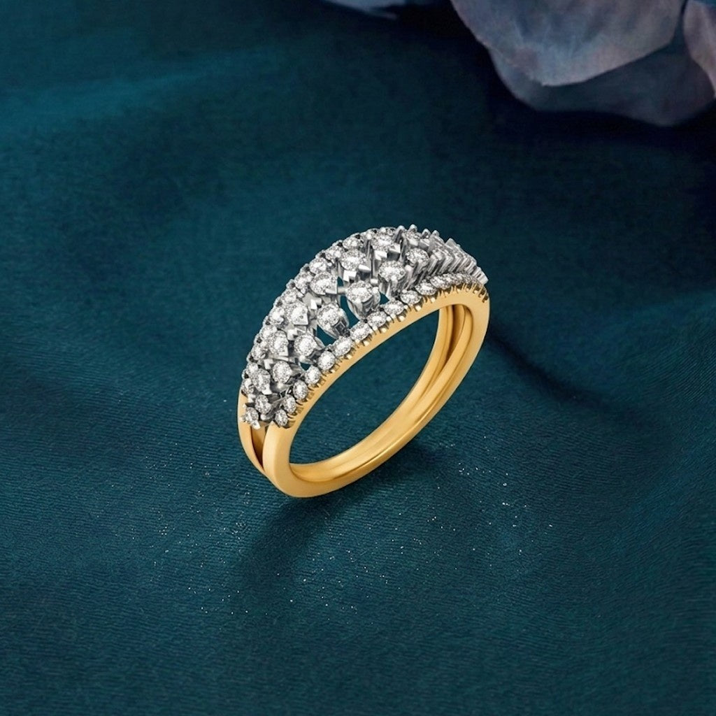 Gold ring with diamonds on a dark blue background.