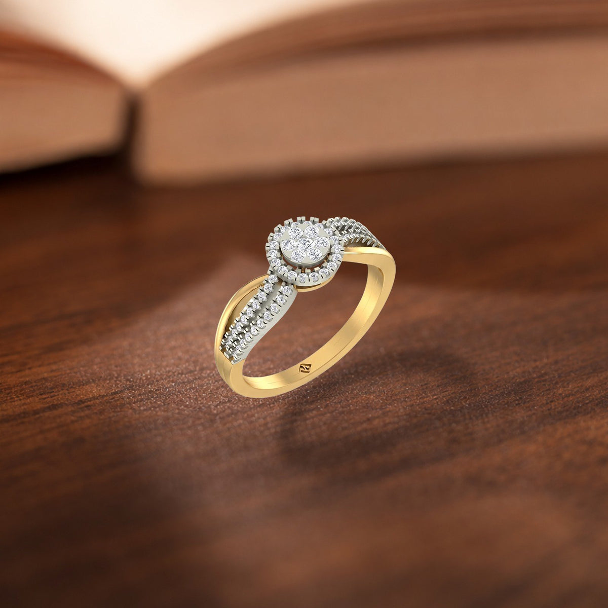 Gold and diamond ring with cluster accents on a wooden surface.