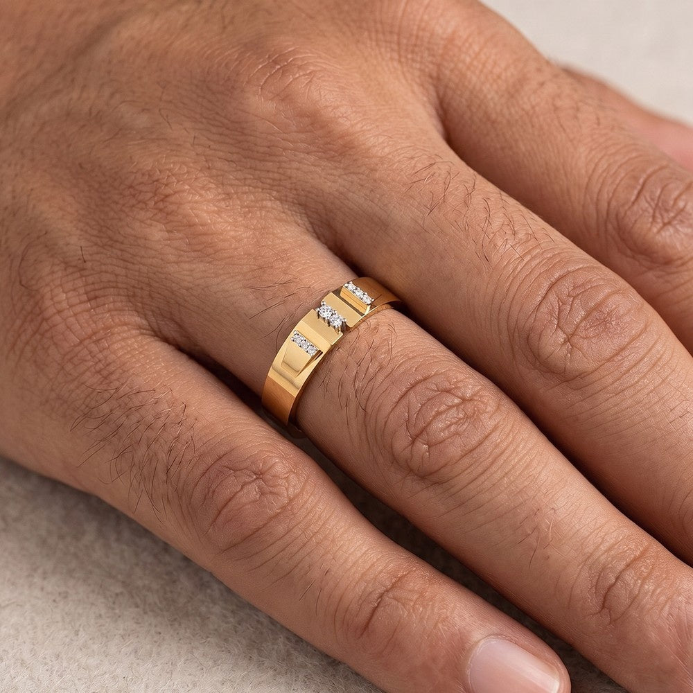 Close-up shot of a gold and diamond men's ring.