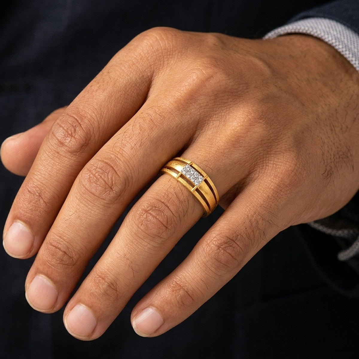 Close-up shot  of a gold ring with diamond accents ring.