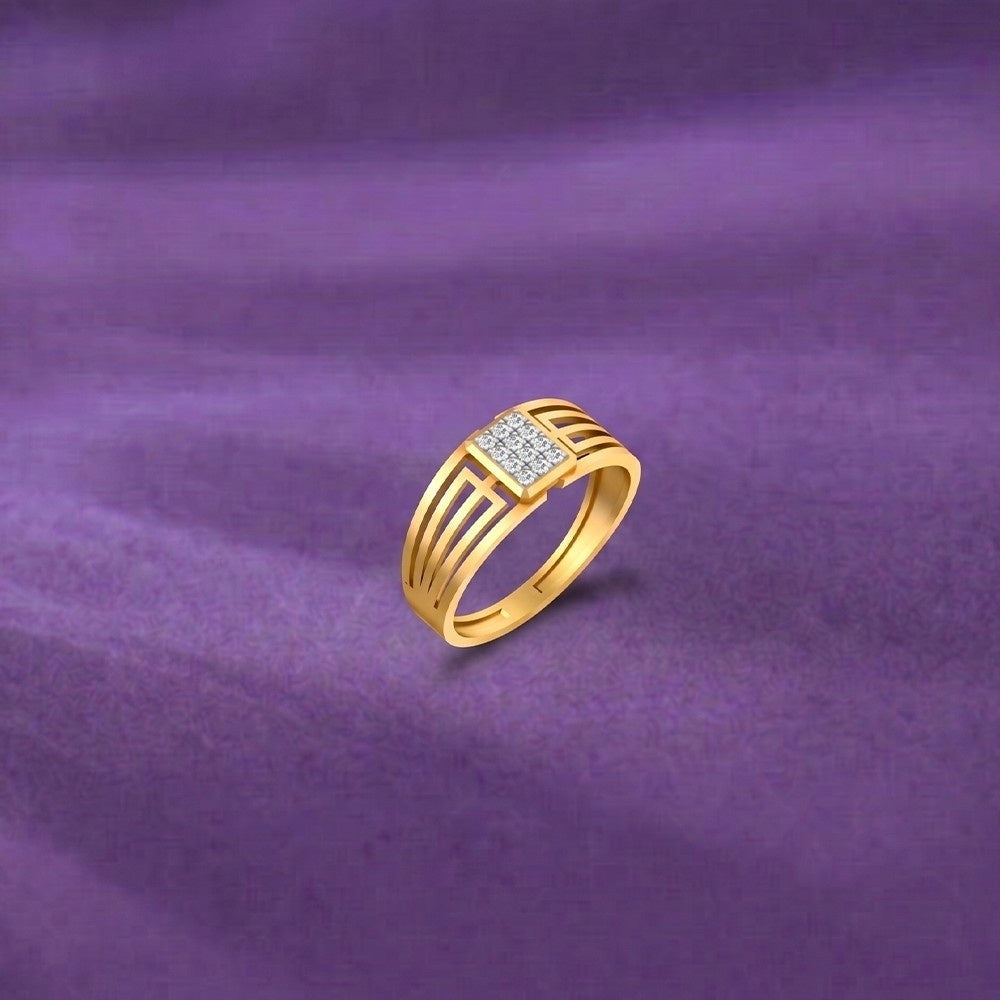 Gold and diamond band ring on a purple surface.