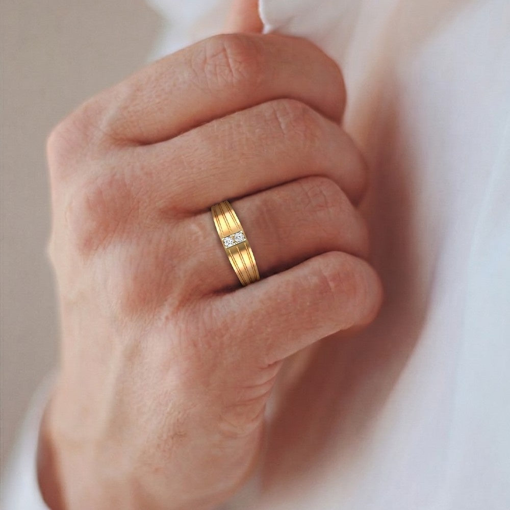 Close-up shots of a gold and diamond men's ring.