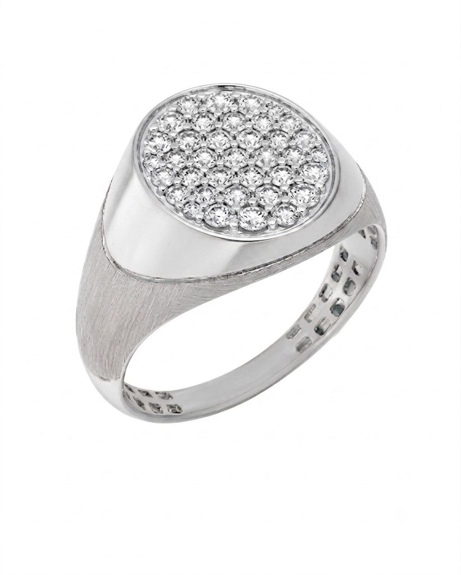 A white gold signet ring featuring a round pavé diamond face, on a clean white background.