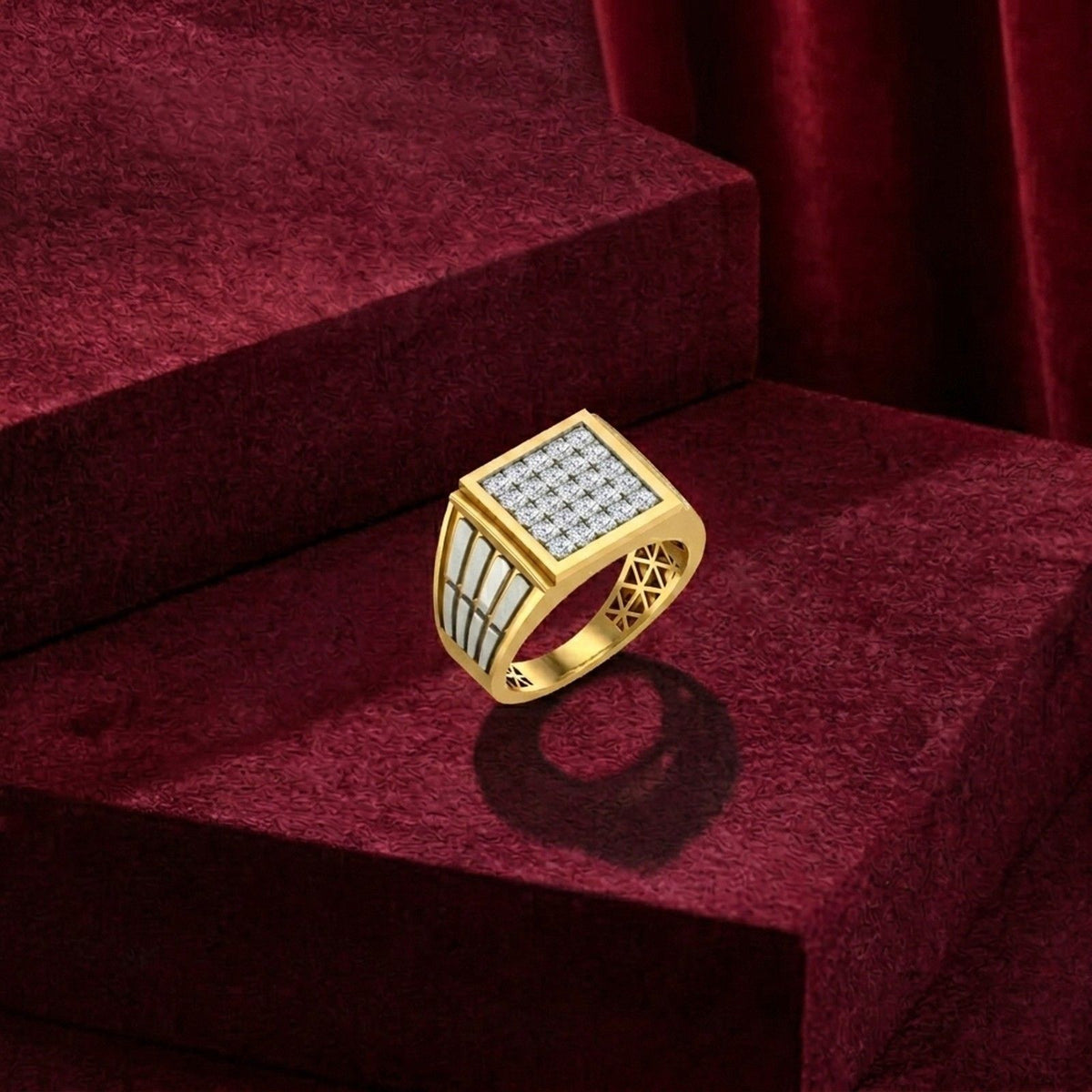 Gold ring with diamond accents on a red velvet surface