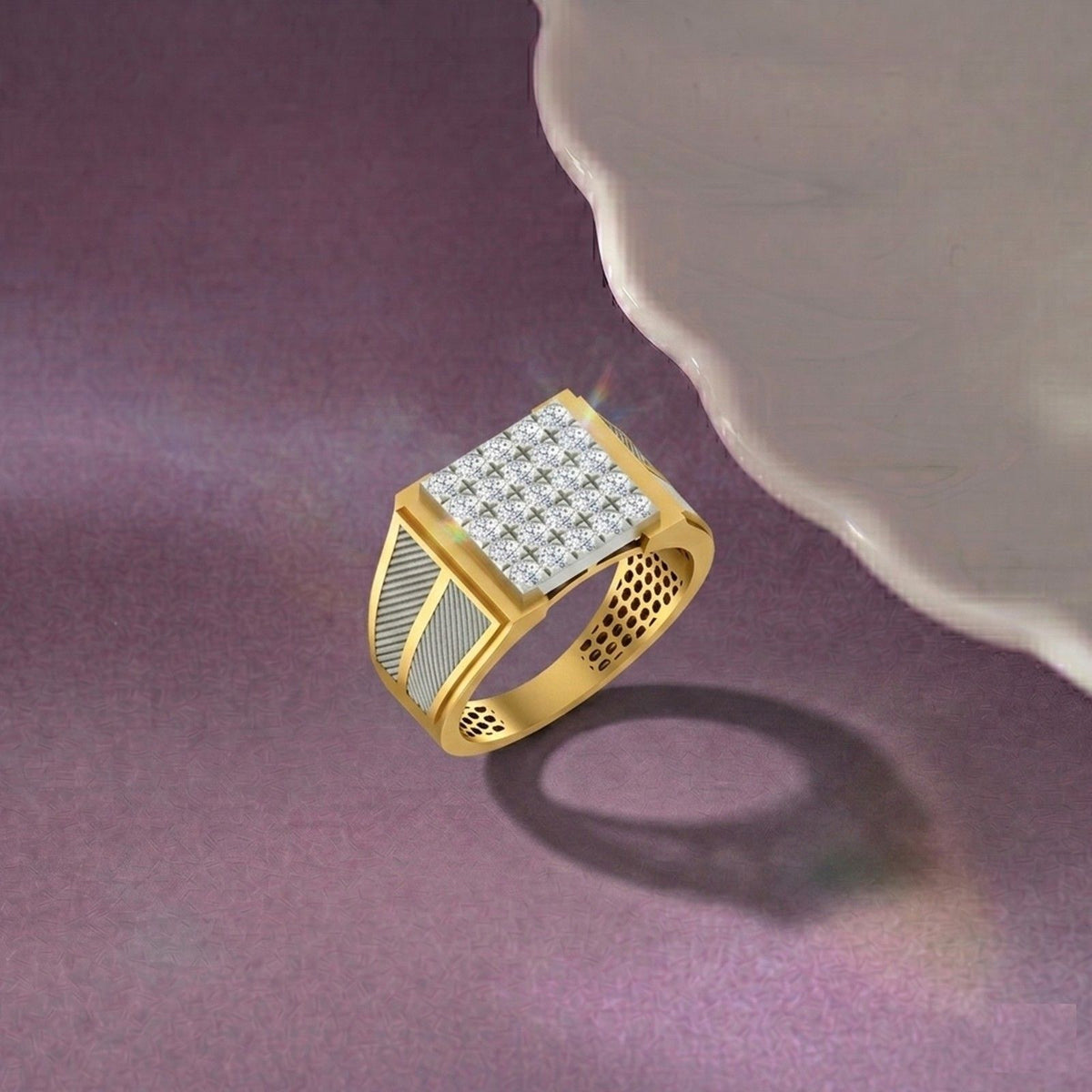 Gold ring with diamond accents on a purple surface