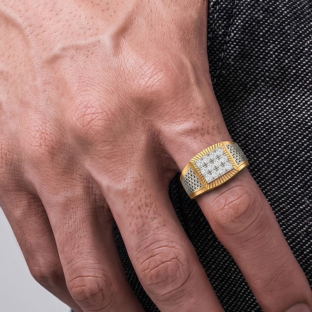 Gold ring with diamonds on a finger against a black denim background