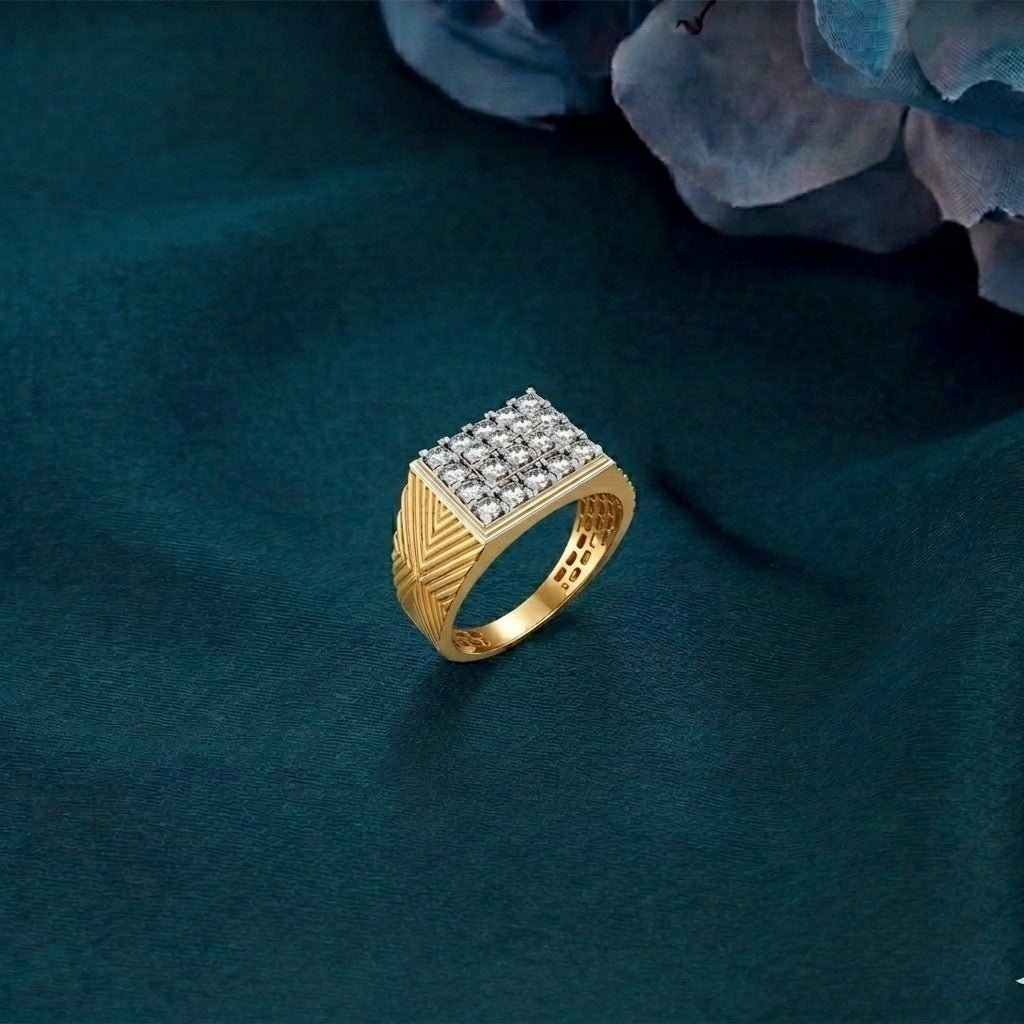 Gold ring with diamond accents on a textured green surface.