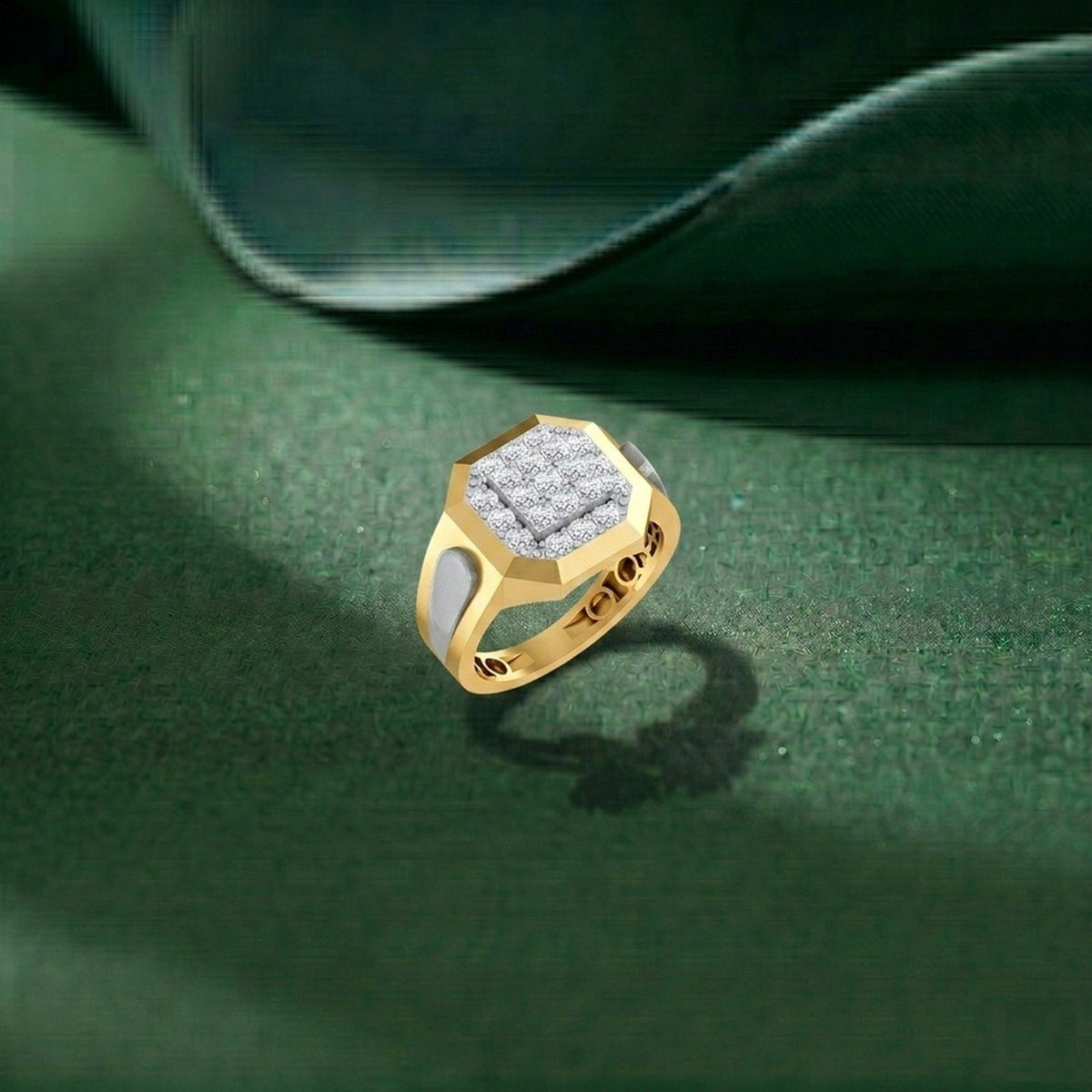 Gold ring with a diamond-like center on a green leaf background
