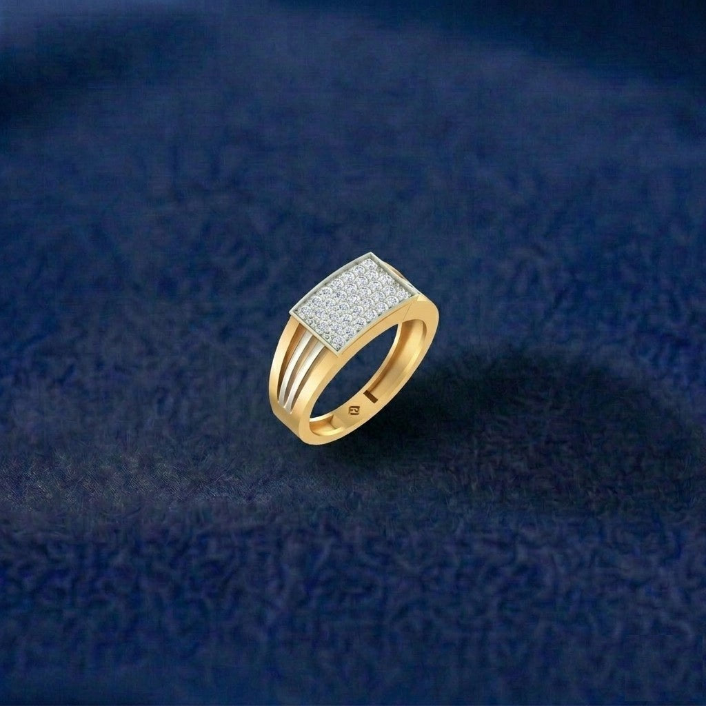 Gold ring with diamond accents on a textured blue background