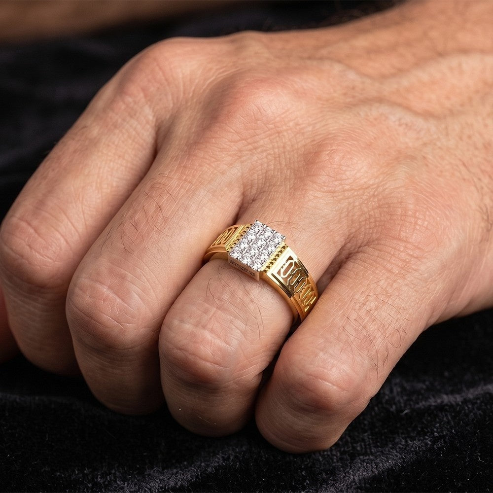 Close-up of a hand wearing a gold ring with diamond accents on a dark background.