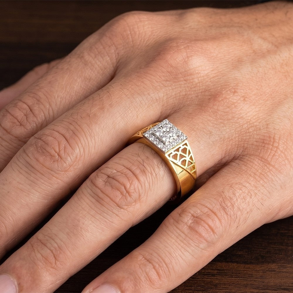 Close-up shot of a gold and diamond band ring for men.