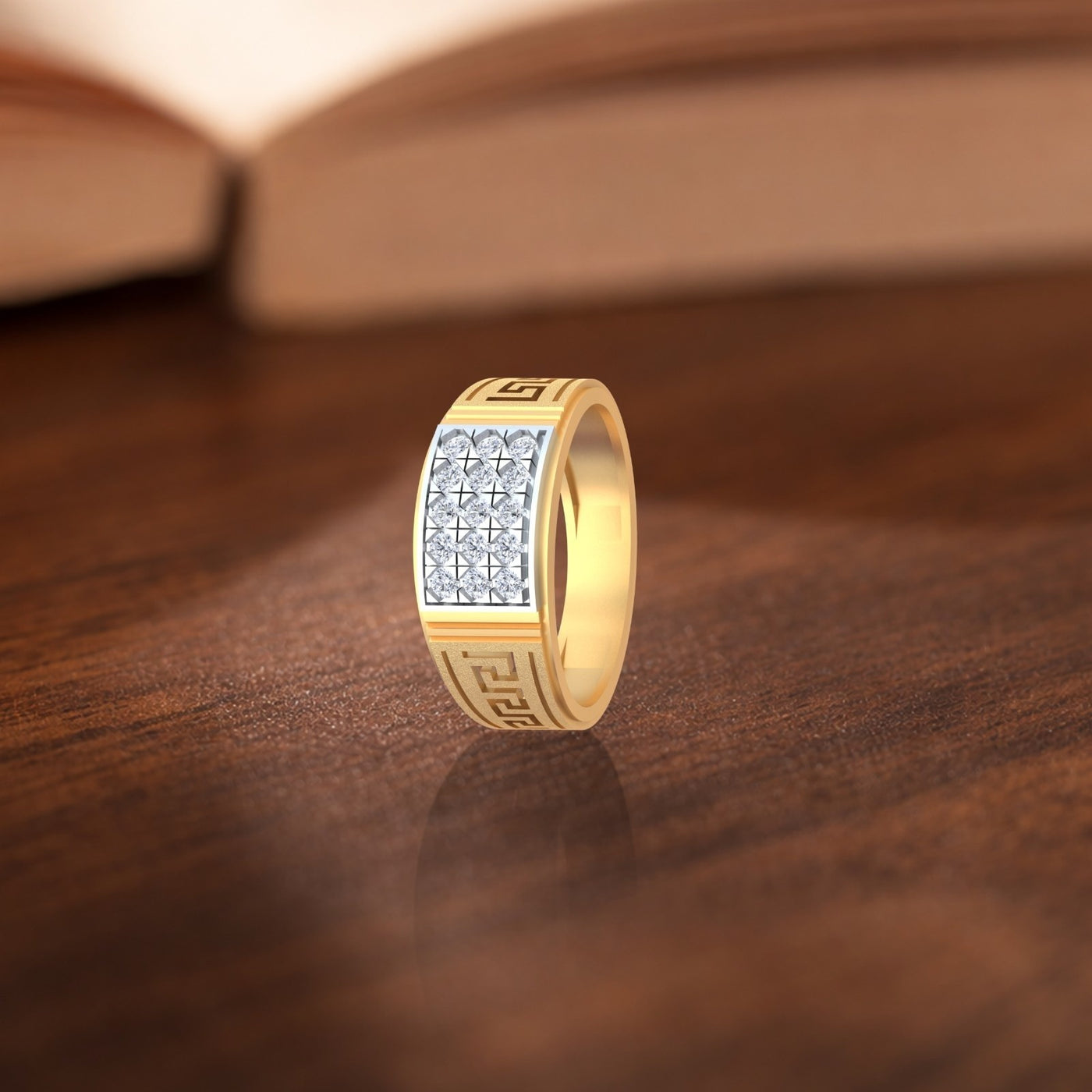 Gold ring with diamond accents on a wooden surface