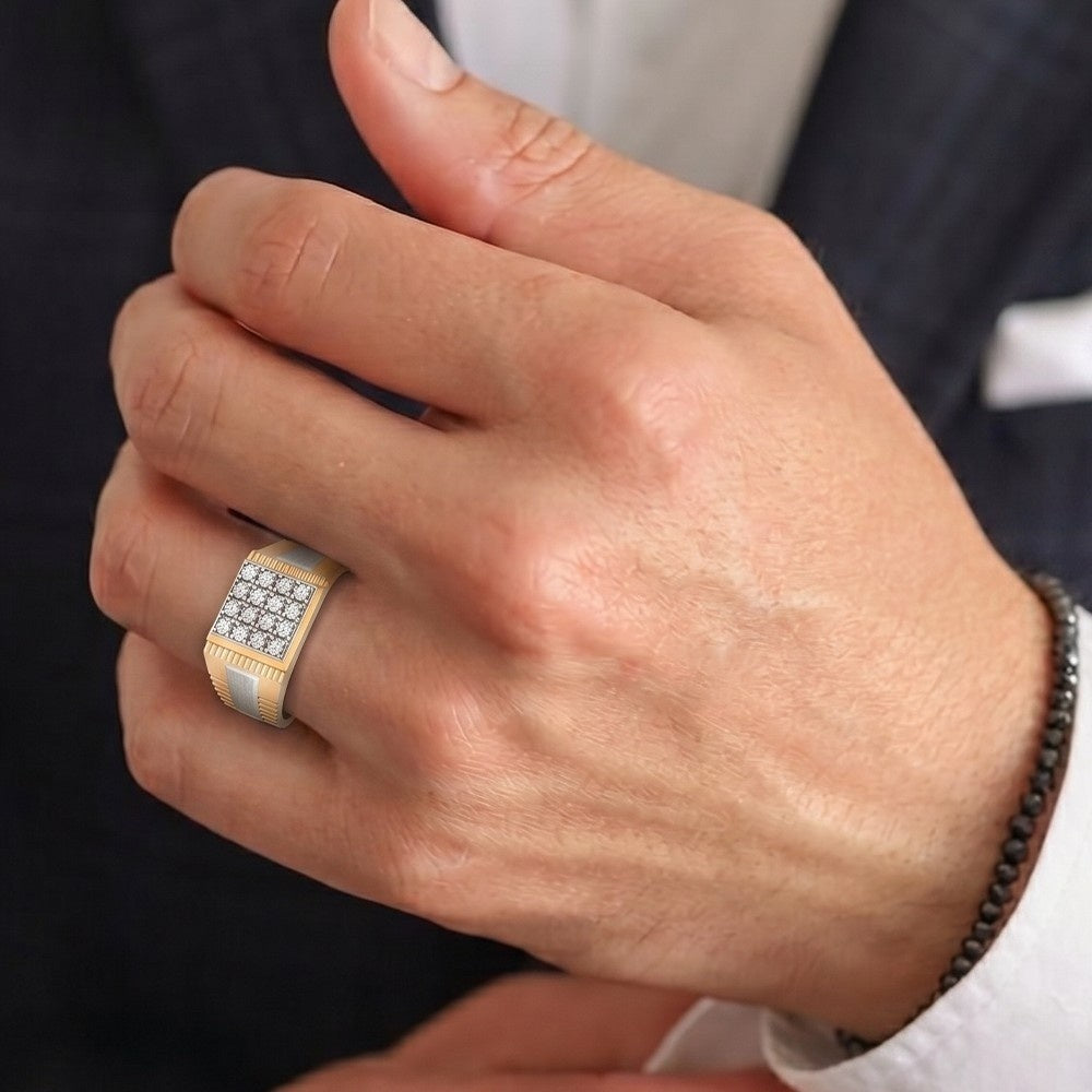Close-up of a hand wearing a gold ring with a diamond band.