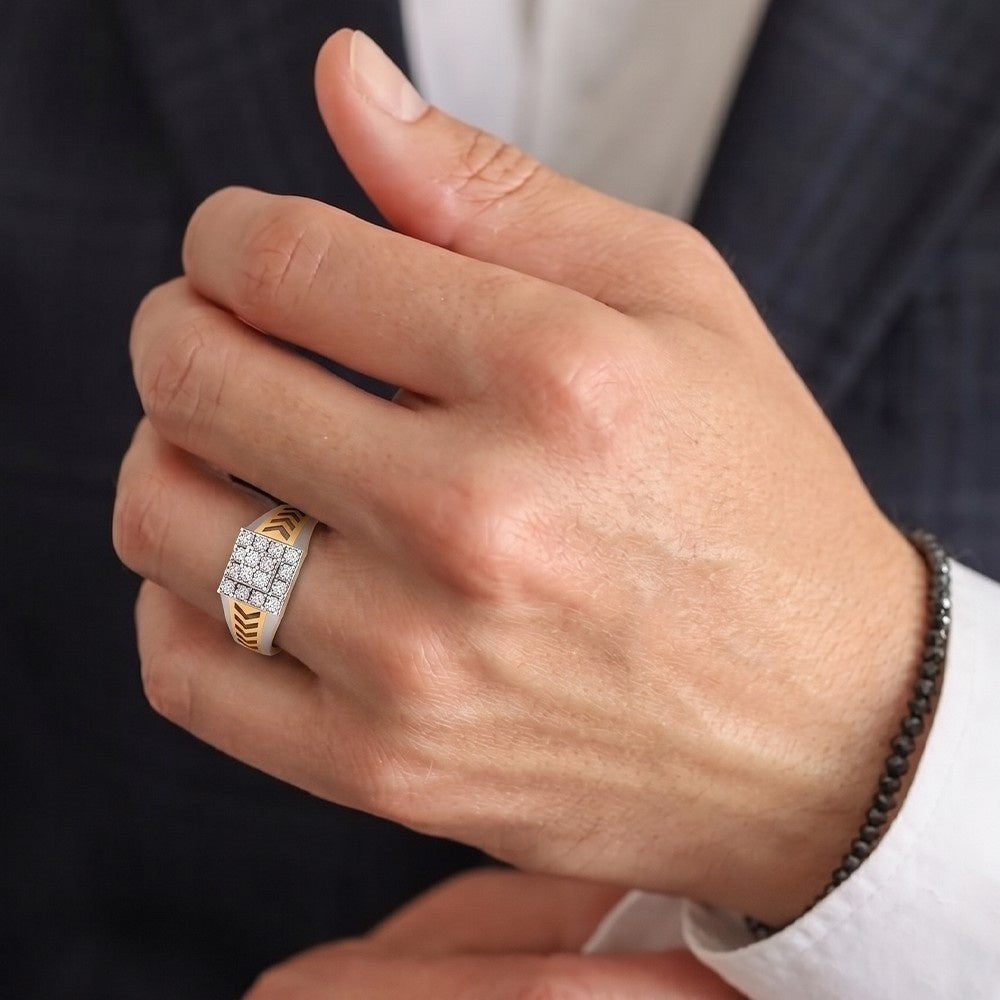 Close-up of a hand wearing a diamond ring with a dark background