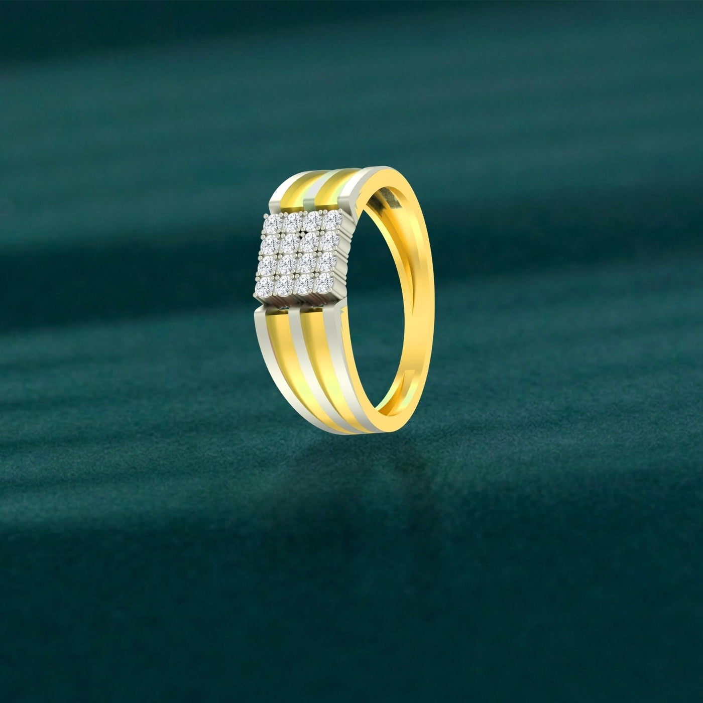 Gold ring with diamond accents on a green textured background.