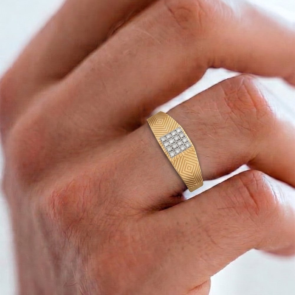 Gold ring with diamond accents on a person's finger against a white background