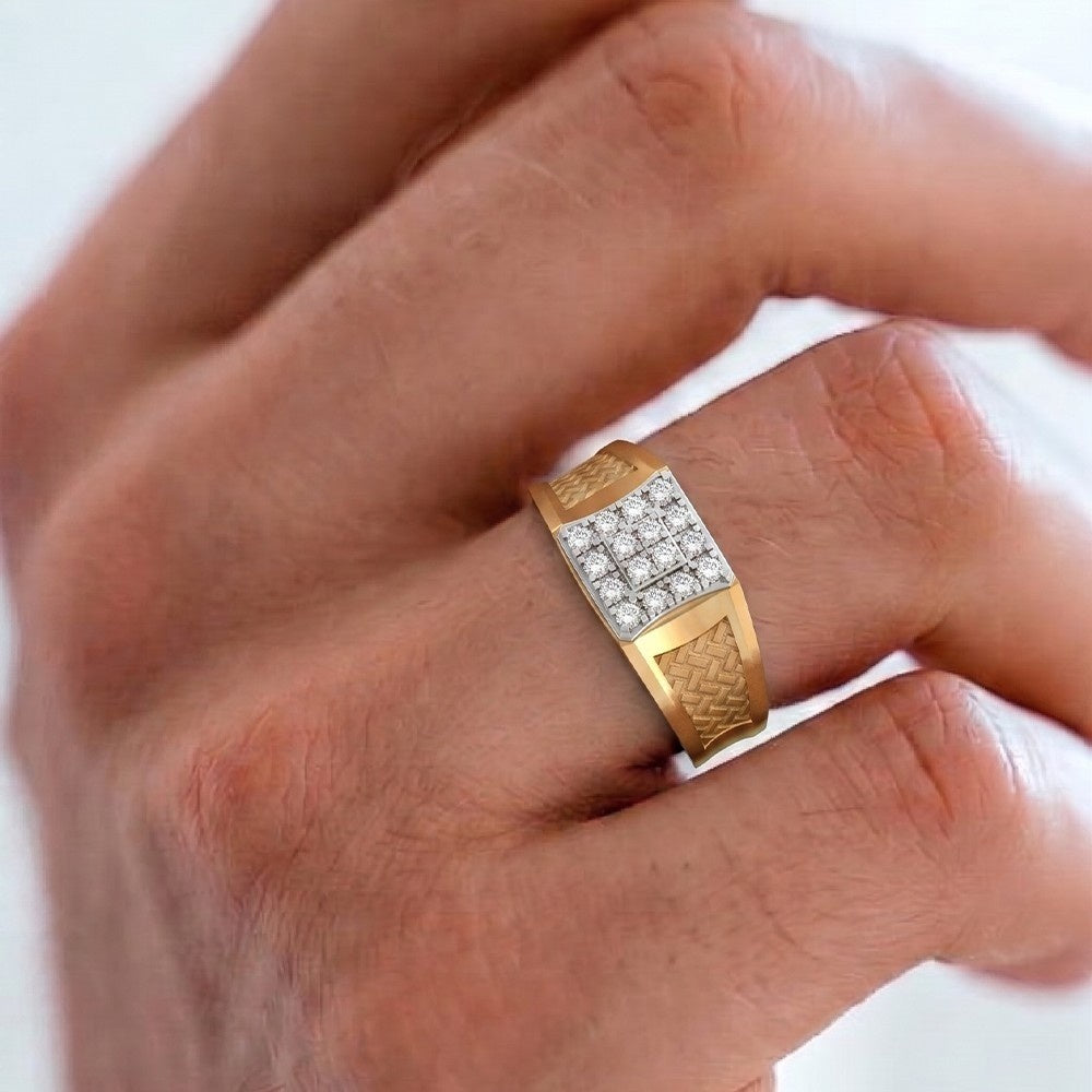 Gold ring with diamond accents on a hand against a white background
