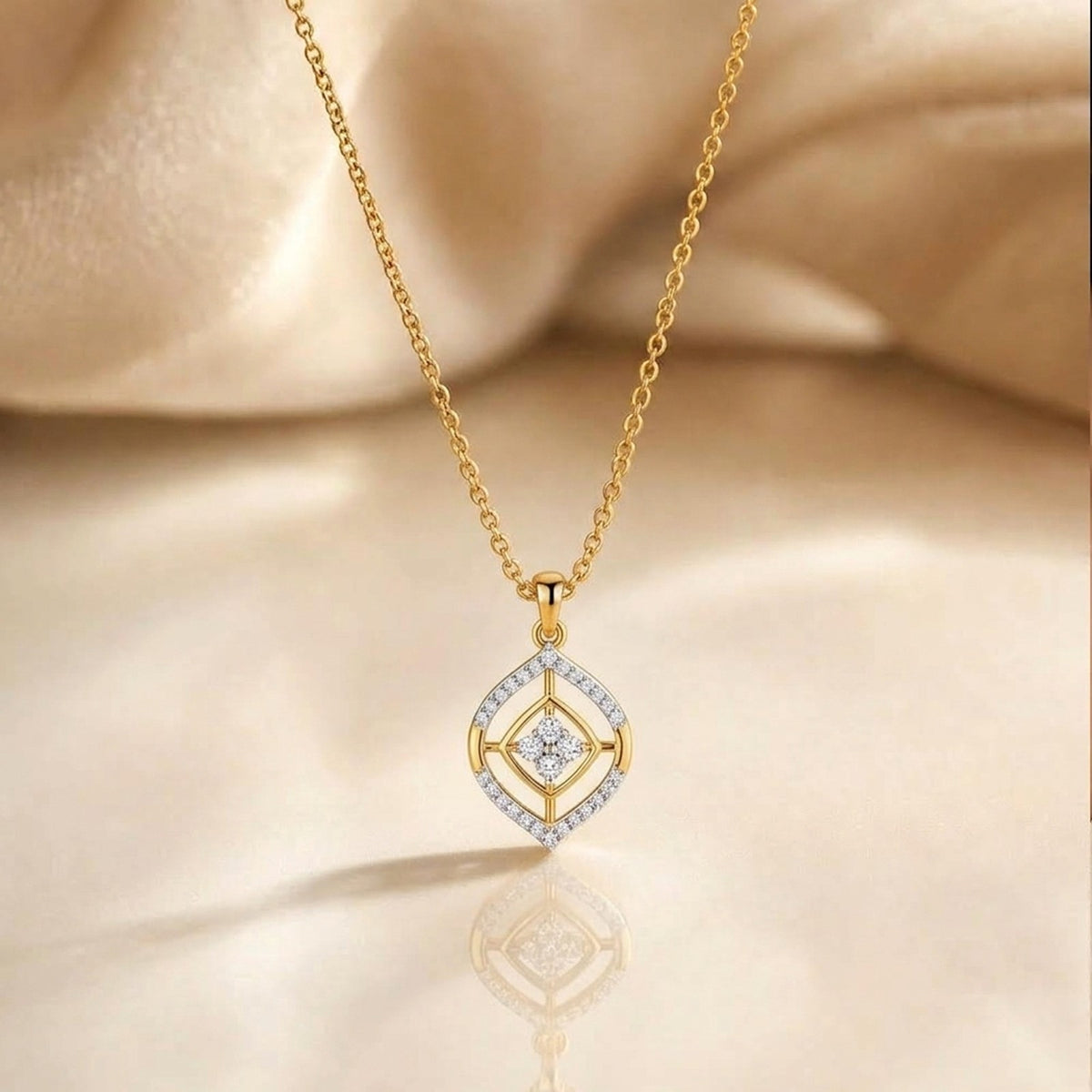 Gold and diamond pendant on beige background
