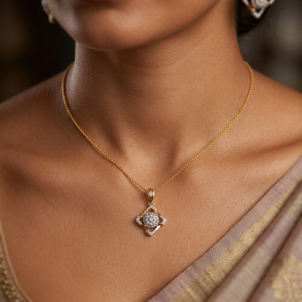 Gold and diamond pendant on person neck.