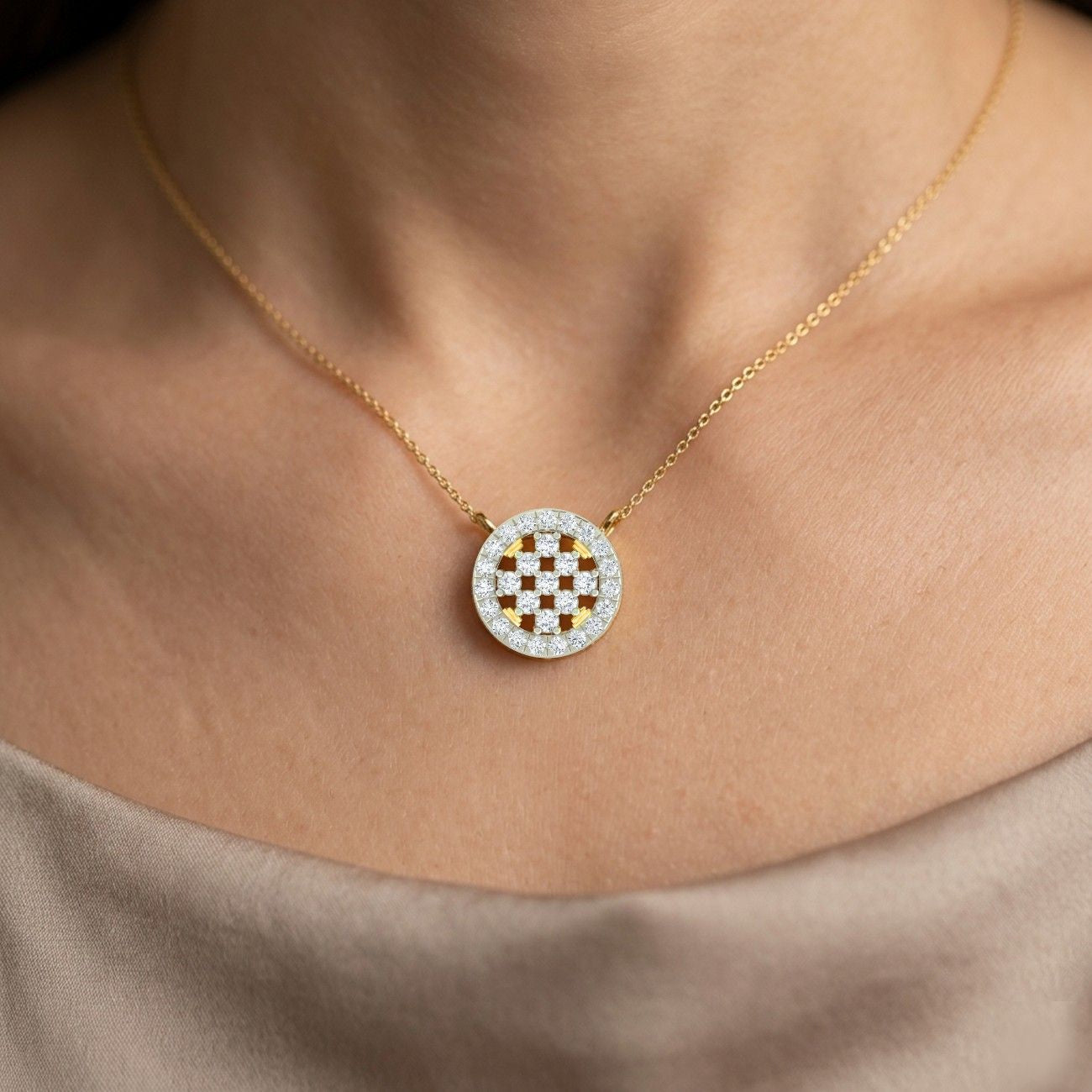 Women wearing gold And  Diamond pendant 