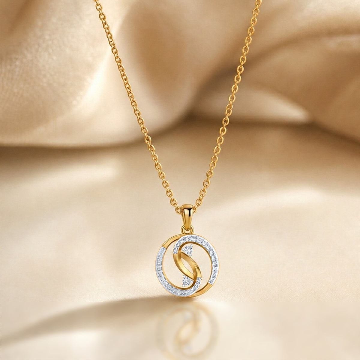 Gold and diamond pendant on blur background