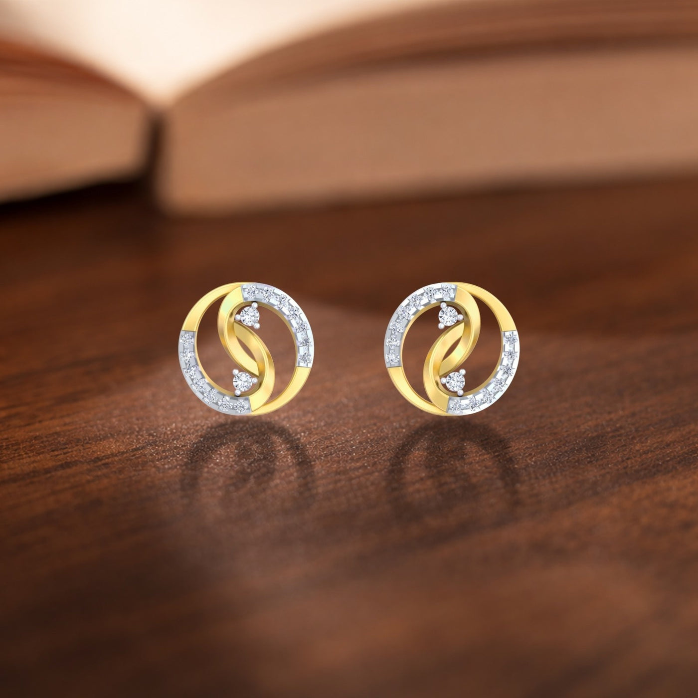 Gold and diamond gold stud earrings with round-shaped, featuring an interlocking circular.