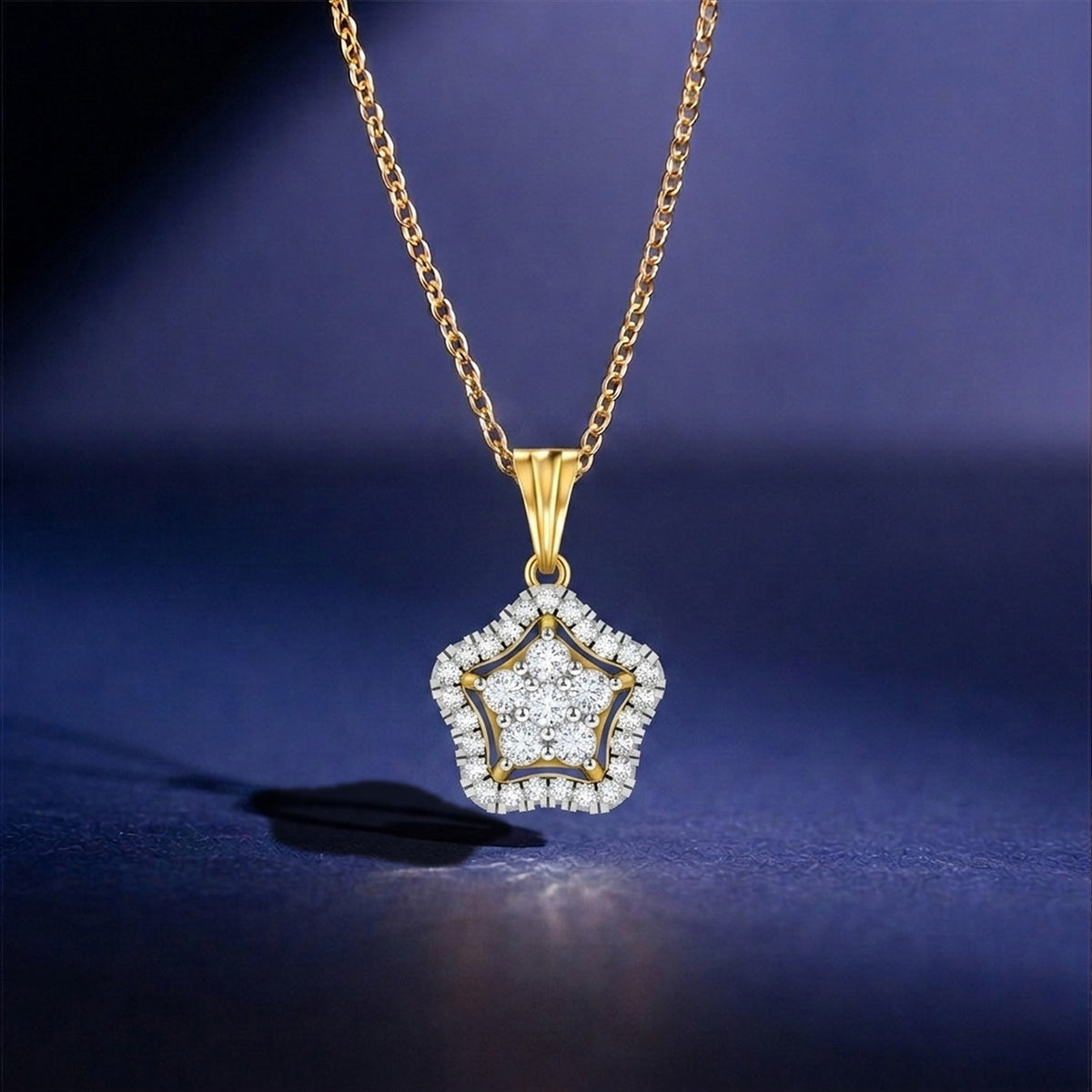 Gold and diamond pendant on blue background