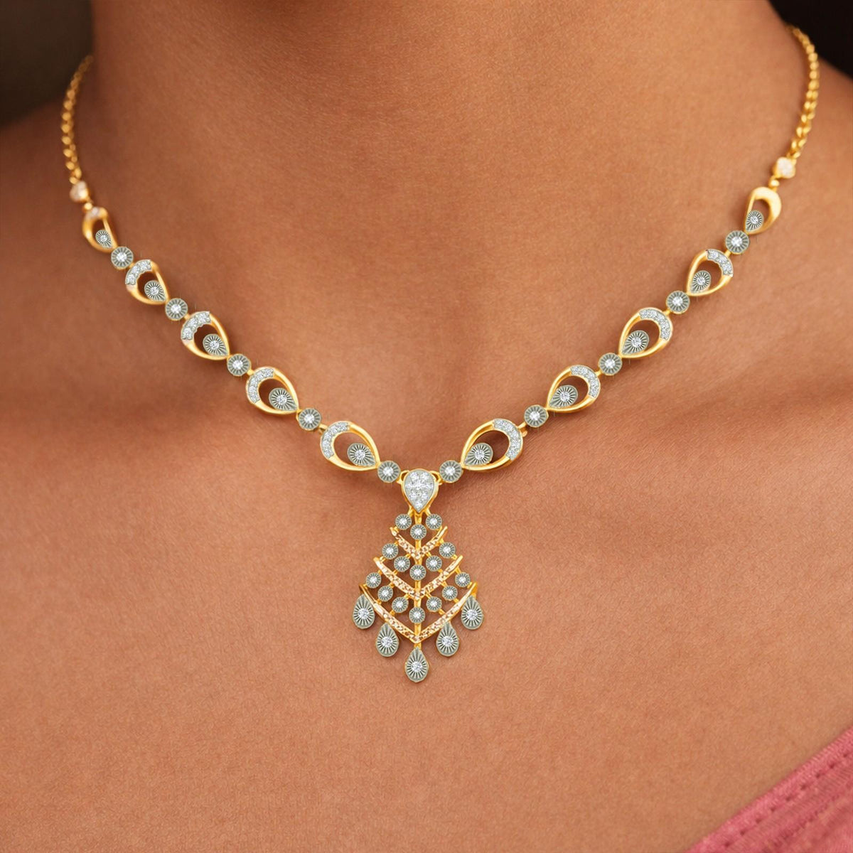 Gold and diamond necklace worn on a model's neck, featuring a detailed with teardrops.