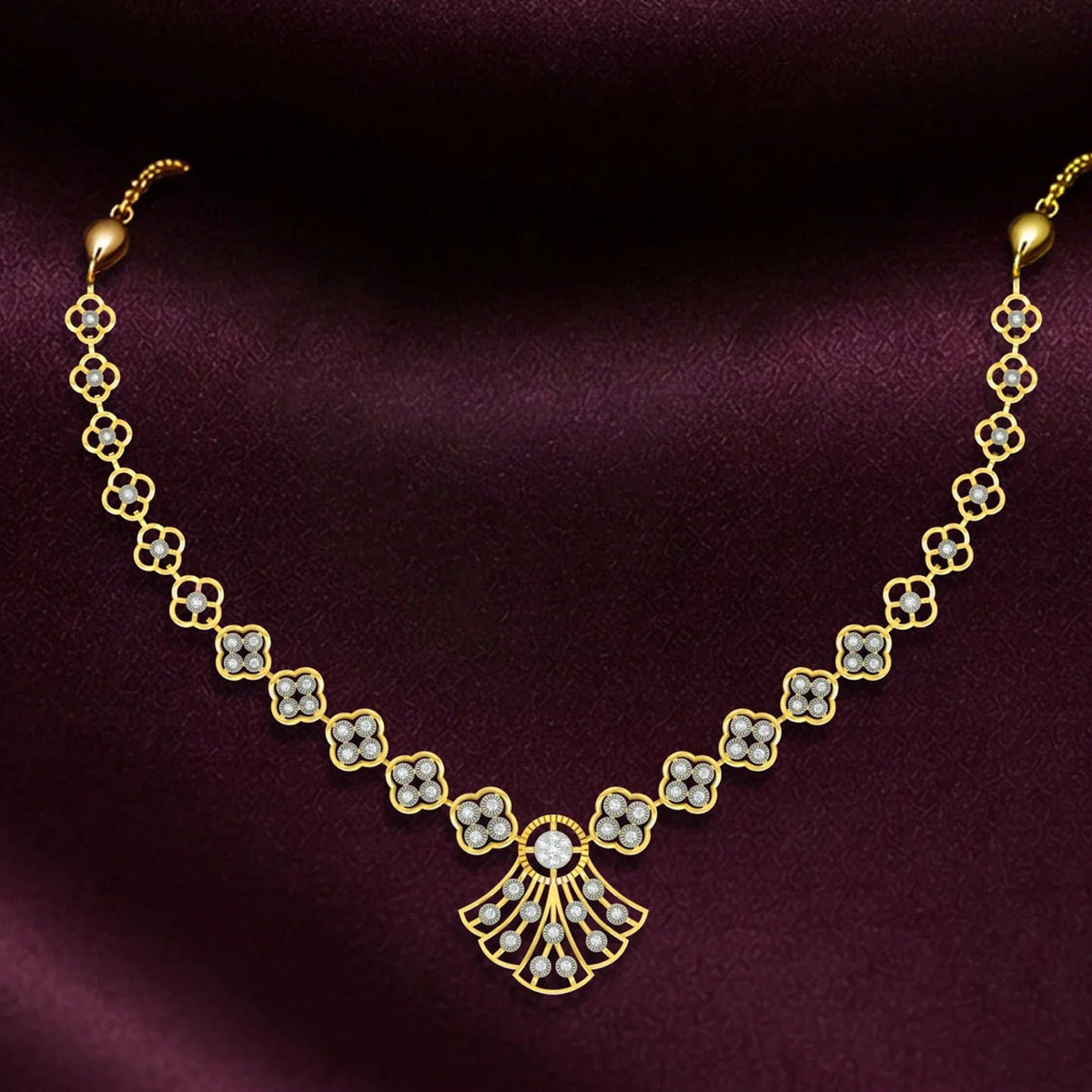 A gold and diamond necklace set arranged in a geometric pattern, displayed on a dark purple satin fabric background.
