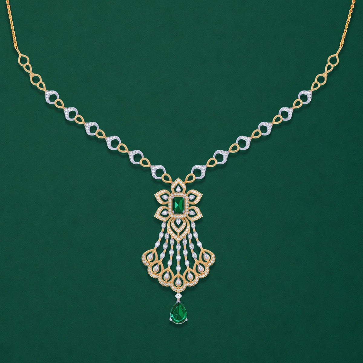 Gold and diamond necklace with green emerald accents, displayed on a solid dark green background.