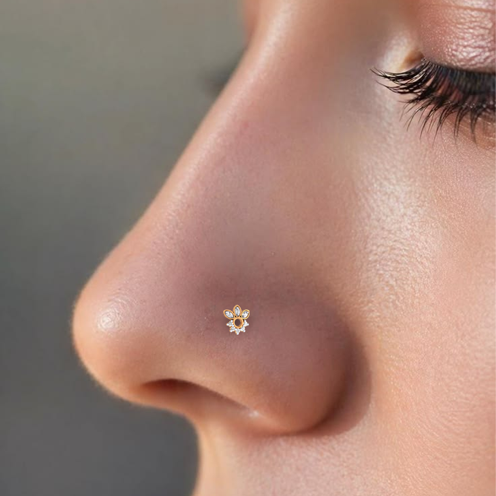 Elegant yellow gold and diamond floral nose pin with sparkling accents 